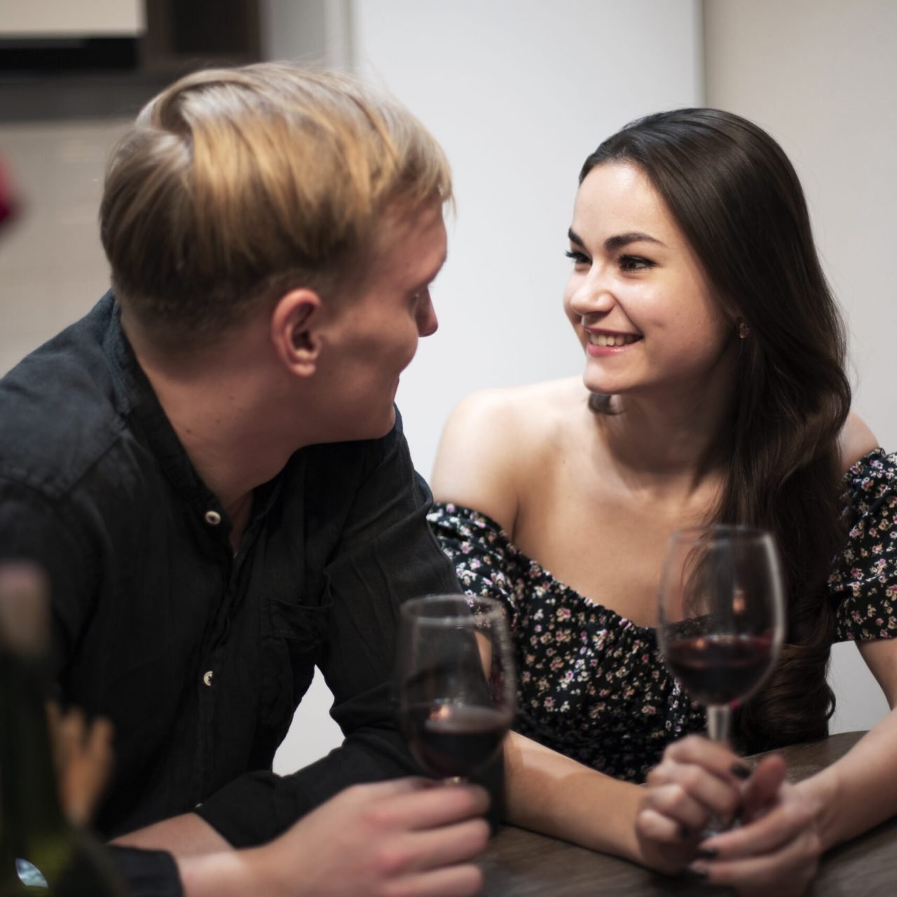 romantic-couple-celebrating-valentines-day-home-with-wine